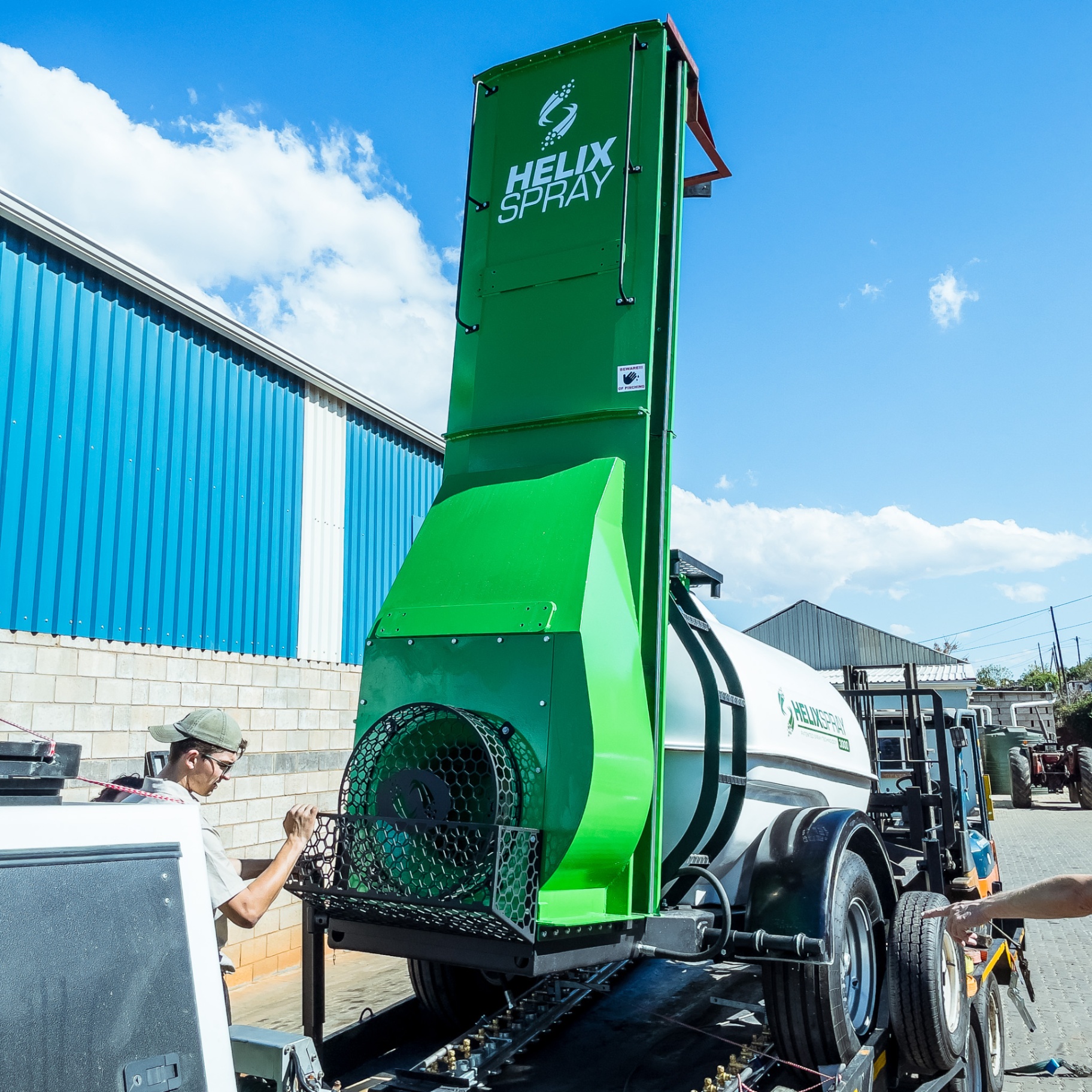 HelixSpray tower sprayer loaded on trailer outside Turn-Rite workshop